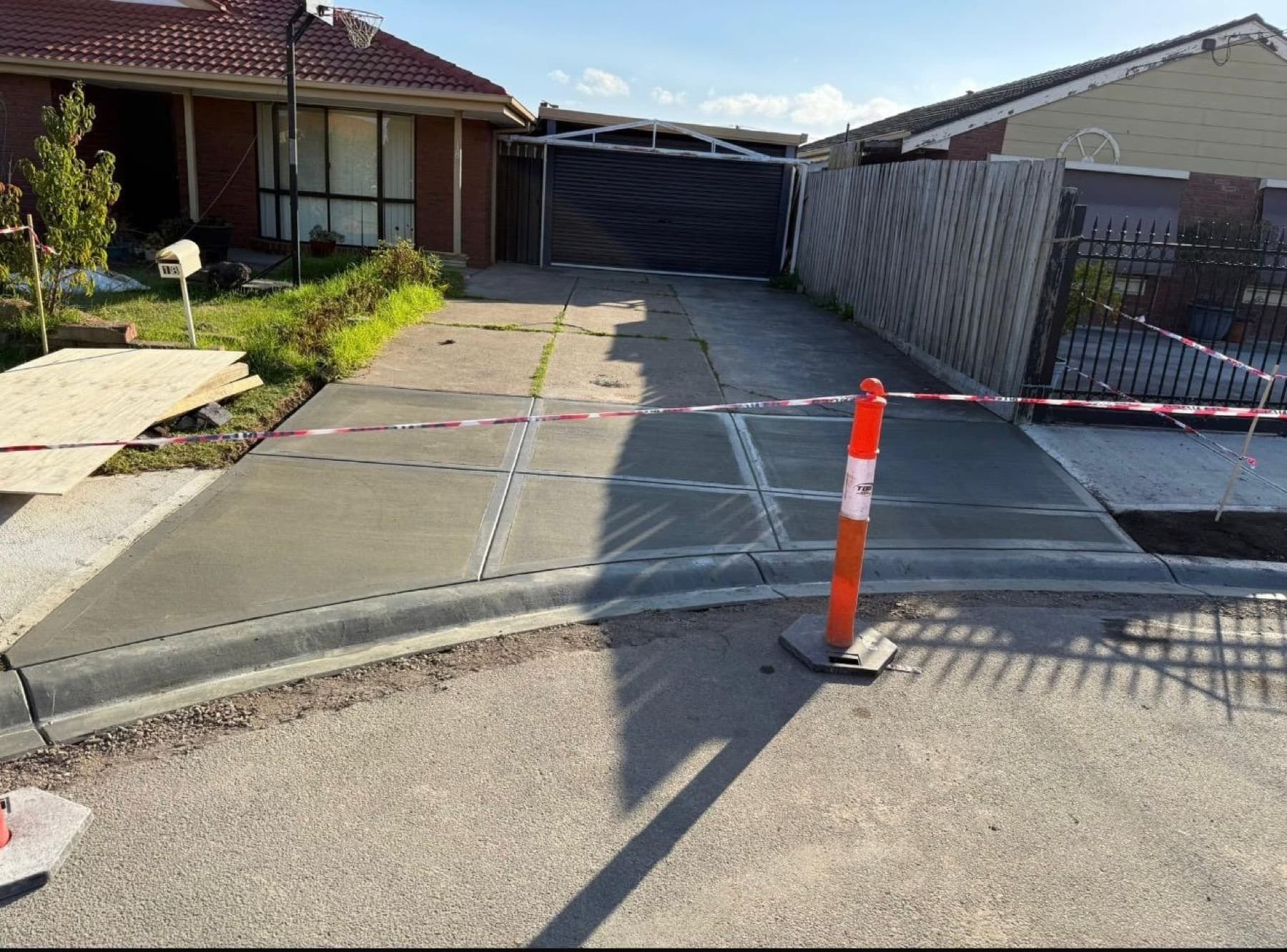 Fresh full vehicle crossover from the driveway gate down the kerb layback to the road
